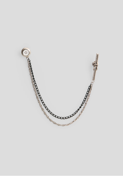 Чоловіча брошка на піджак у поєднанні світлого металу