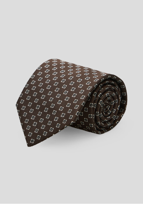 Чоловіча краватка коричнева з біло-чорним геометричним візерунком